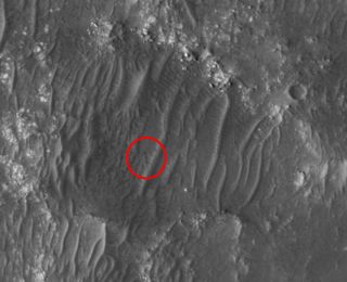 The Ingenuity helicopter, circled in red, seen from space on Mars on March, 31 2022.