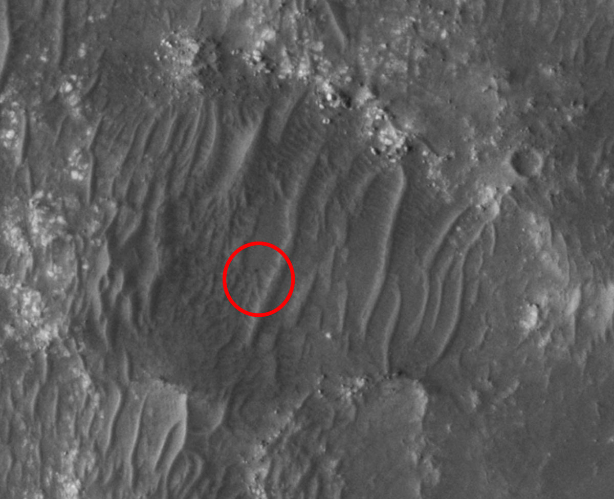 The Ingenuity helicopter, surrounded in red, was seen from the sky on Mars on March, 31 2022.