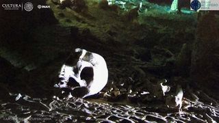 The skull from an ancient human was found inside the Sac Actun cave system.