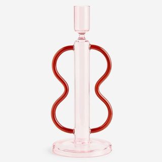 Shapely glass candlestick in pink and red