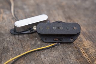 Joe Bonamassa 1950 Broadcaster pickups on a wooden backgrop