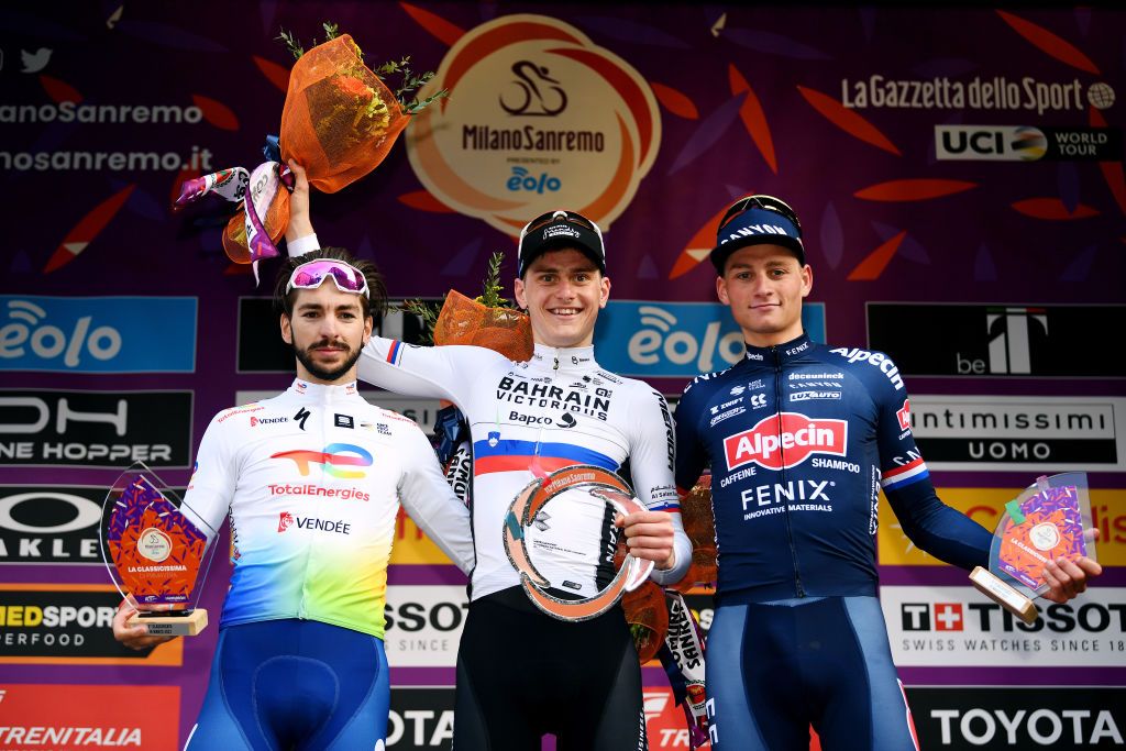 SANREMO ITALY MARCH 19 LR Anthony Turgis of France and Team Total Energies on second place race winner Matej Mohoric of Slovenia and Team Bahrain Victorious and Mathieu Van Der Poel of Netherlands and Team AlpecinFenix on third place pose on the podium during the podium ceremony after the 113th MilanoSanremo 2022 a 293km one day race from Milano to Sanremo MilanoSanremo on March 19 2022 in Sanremo Italy Photo by Tim de WaeleGetty Images