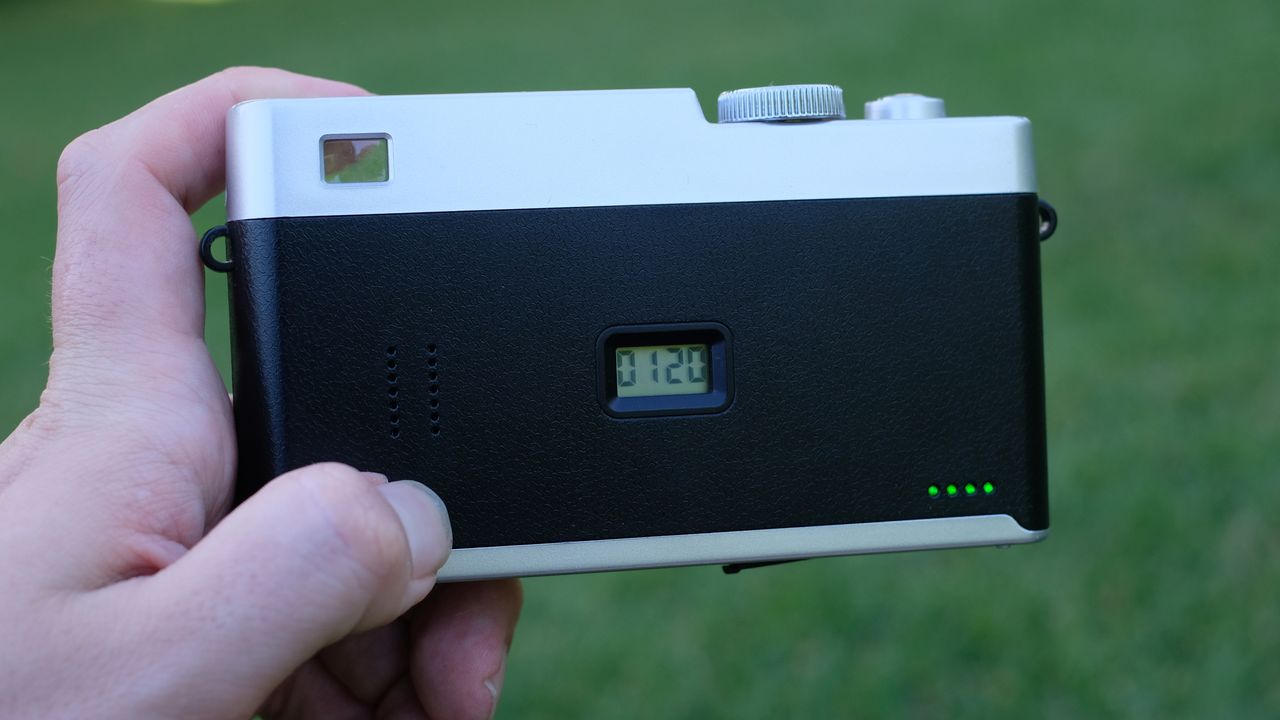 Photograph of Camp Snap CS-Pro digital compact camera with screen and battery LEDs visible