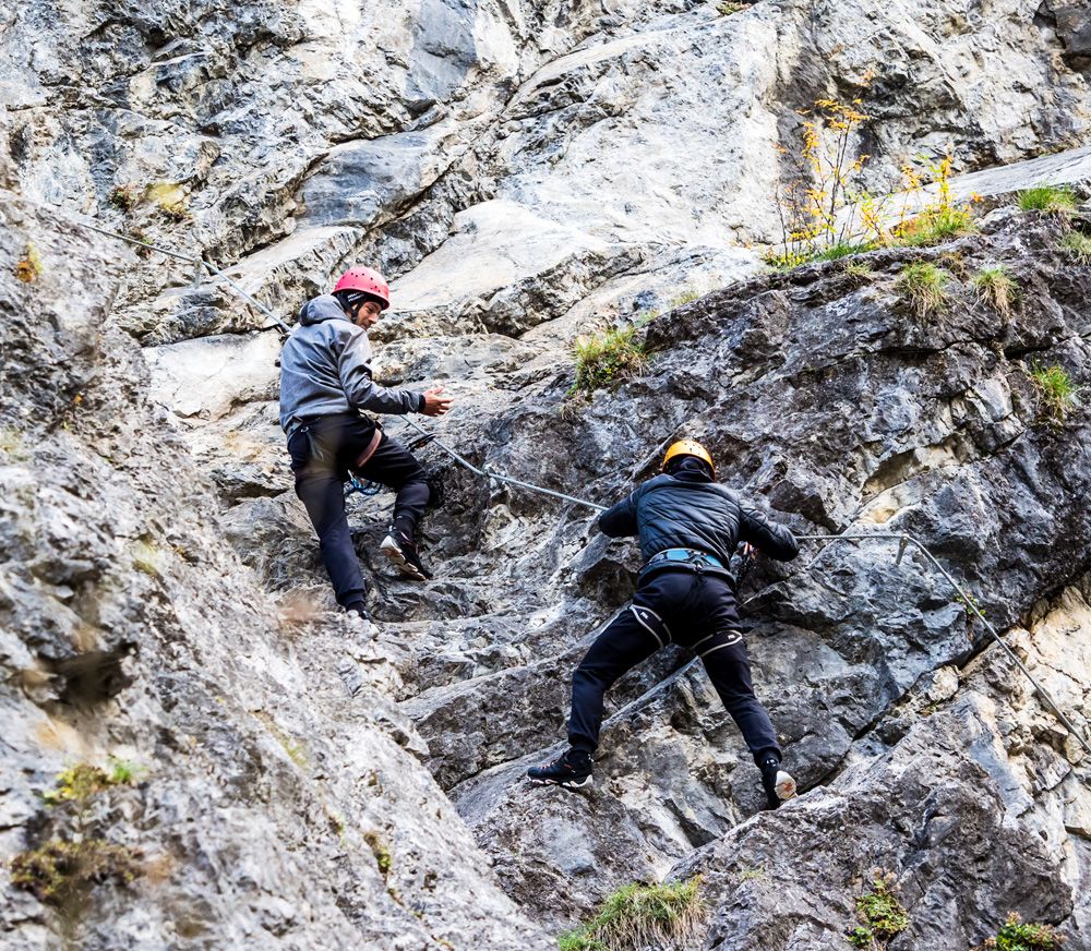 Rock climbing, like cycling, is a team effort