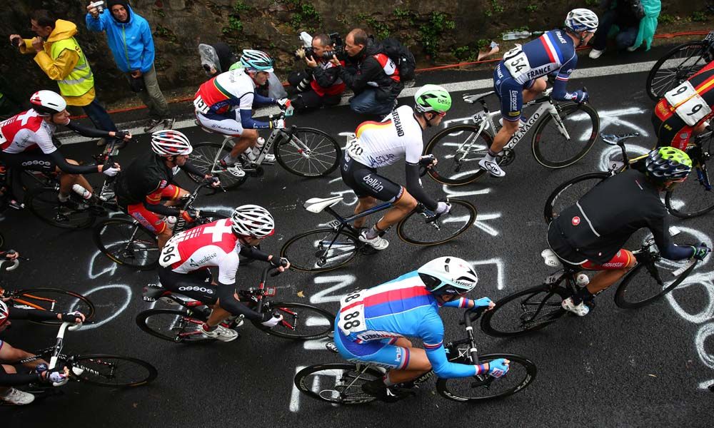 The peloton ride by during the 2013 road race