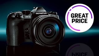 Olympus OM-D E-M1 Mark II and M.Zuiko 12-40mm f/2.8 Pro lens against a dark background with the text "Great Price"