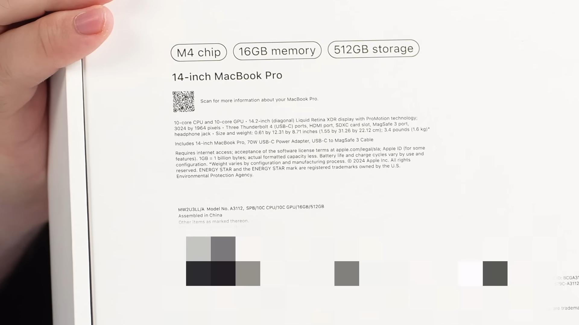 A screenshot of a YouTube video claiming to show the specifications on the back of the product box for the upcoming M4 Apple MacBook Pro 14 laptop.