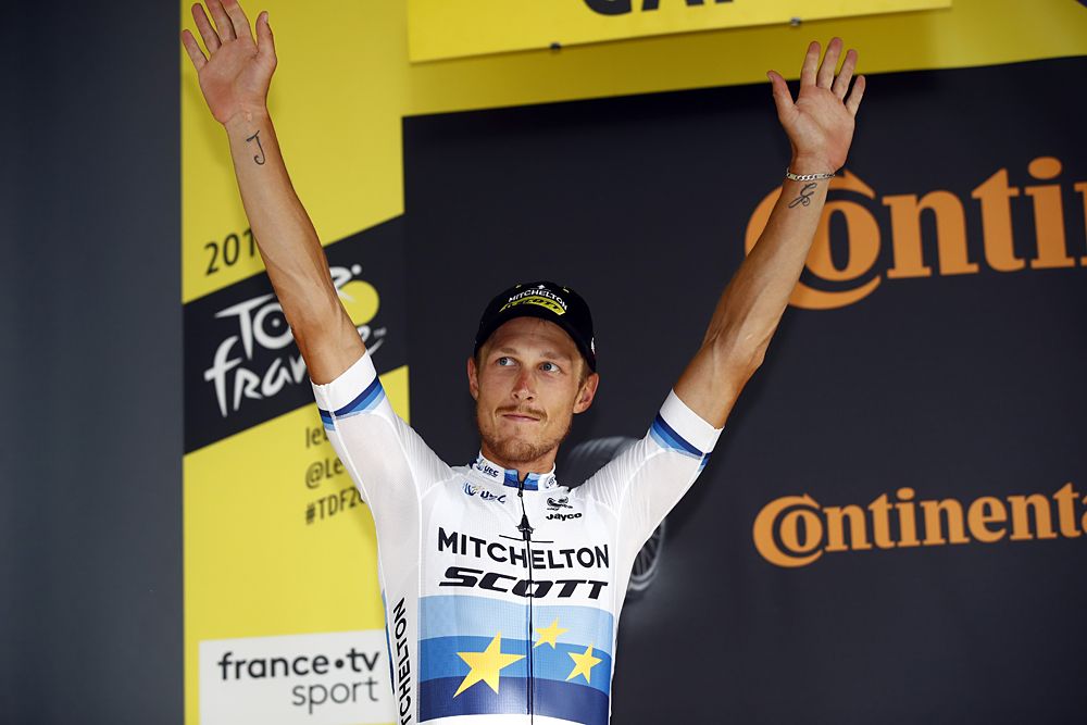 Matteo Trentin (Mitchelton-Scott) celebrates a solo victory on stage 17 at the Tour de France