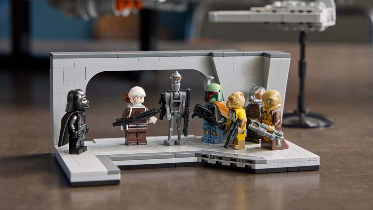 Lego Darth Vader and bounty hunter minifigures on a small diorama
