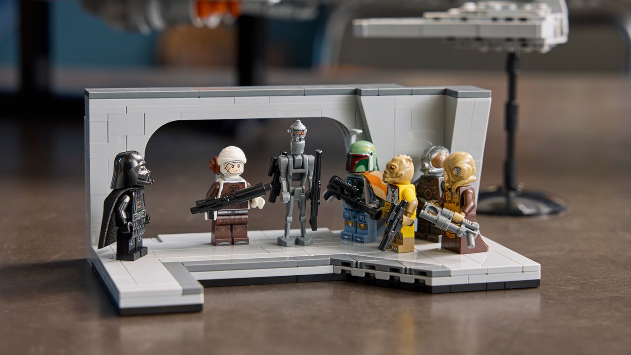 Lego Darth Vader and bounty hunter minifigures on a small diorama