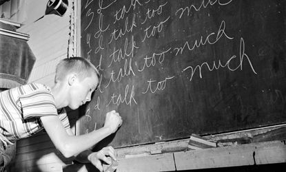 Kid using blackboard