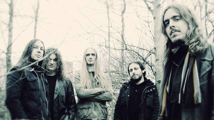 Opeth posing for a photograph in 2012