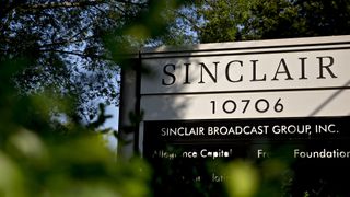 Signage stands outside the Sinclair Broadcast Group Inc. headquarters in Cockeysville, Maryland, U.S., on Friday, Aug. 10, 2018