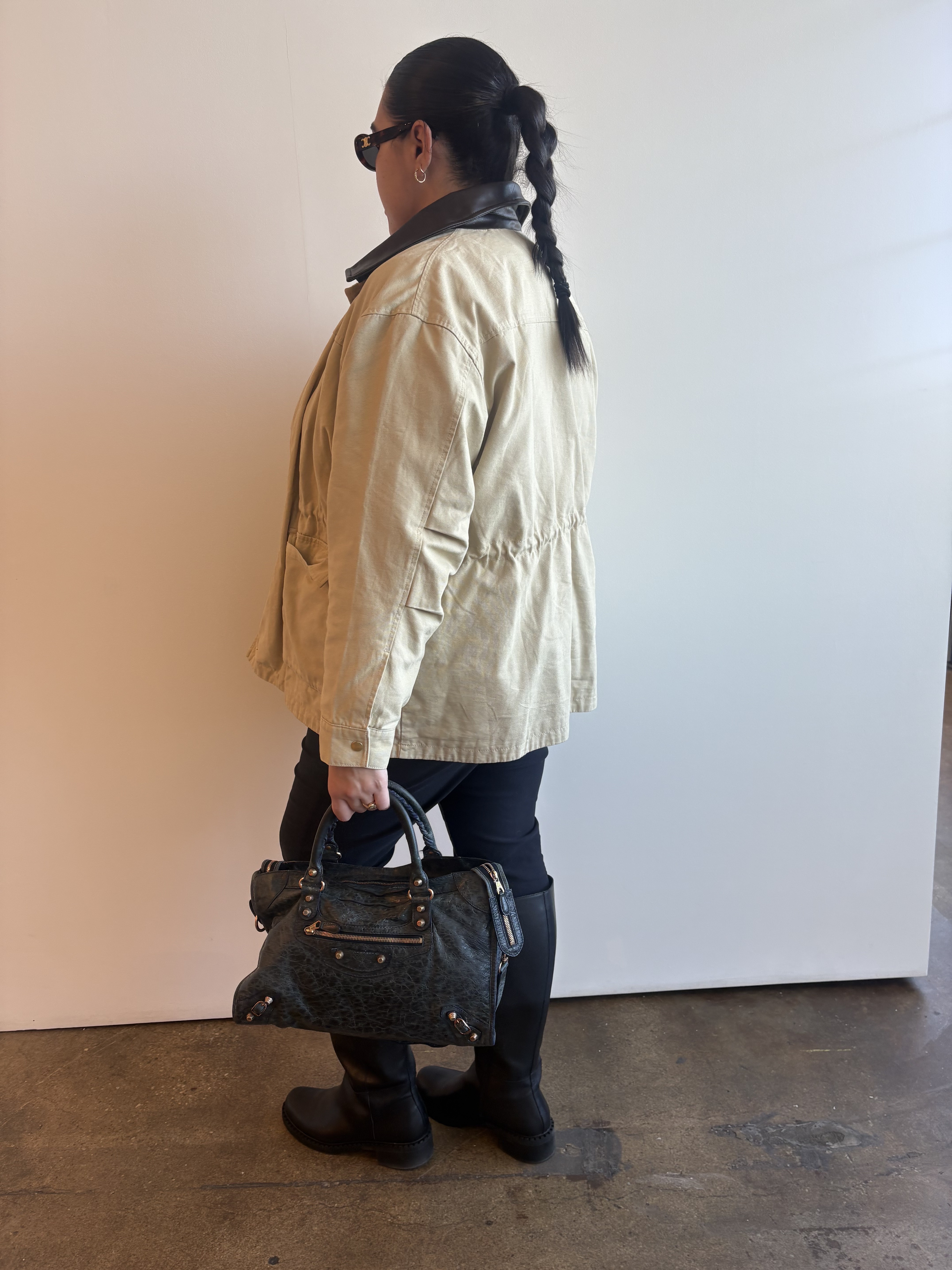 Who What Wear editor Ana Escalante wearing the Balenciaga city bag.