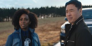 Teyonah Parris on the left, Randall Park on the right