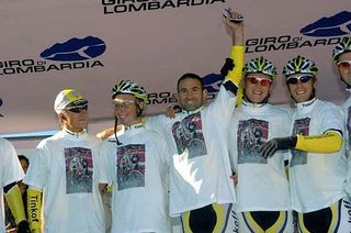 Elio Aggiano celebrates at the start of Lombardia