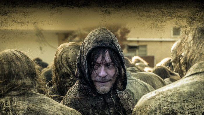 Daryl standing in a crowd in The Walking Dead