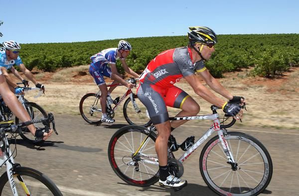 Lance Armstrong passes vineyards in the Barossa.