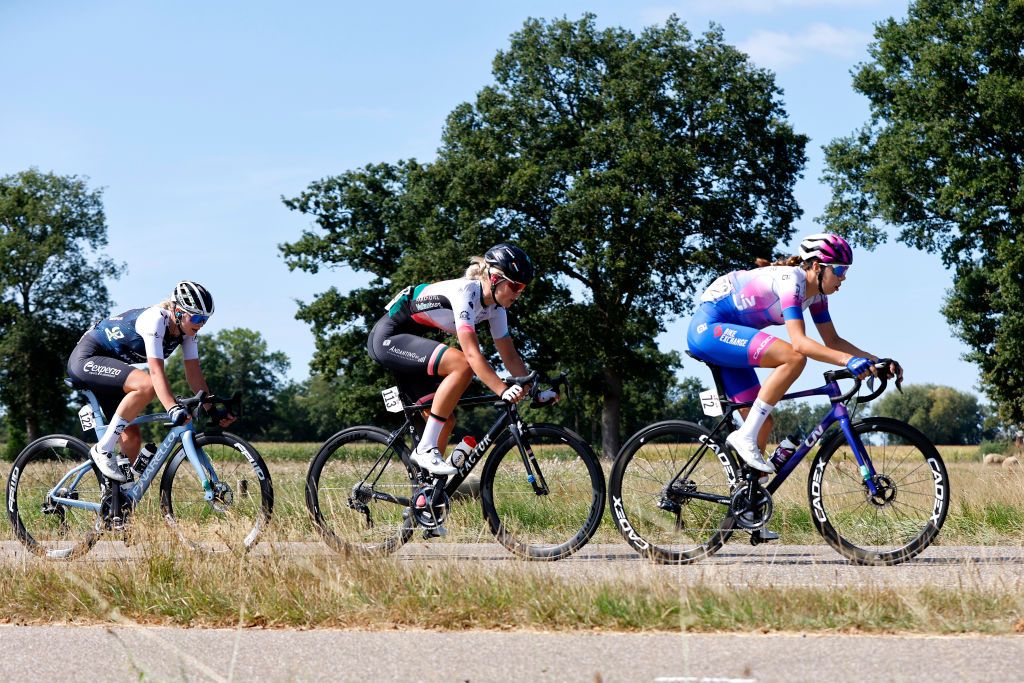 EDE NETHERLANDS AUGUST 31 LR Senne Knaven of Belgium and AG Insurance NXTG Team Lieke Nooijen of Netherlands and Team Parkhotel Valkenburg and Georgia Baker of Australia and Team BikeExchange Jayco compete in the breakaway during 25th Simac Ladies Tour 2022 Stage 2 a 1178km stage from Ede to Ede SLT2022 UCIWWT on August 31 2022 in Ede Netherlands Photo by Bas CzerwinskiGetty Images