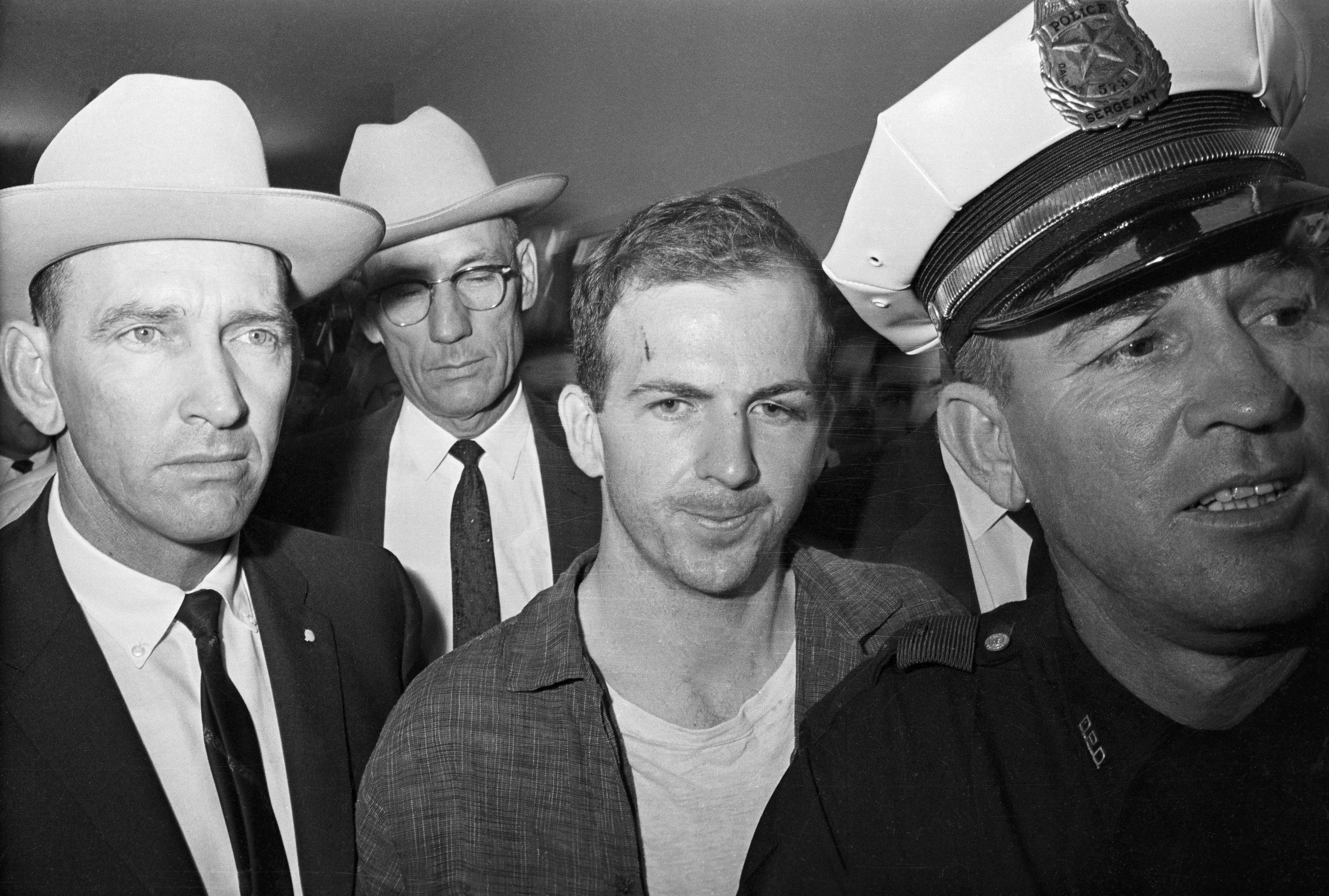 (Original Caption) Twenty-four-year-old ex-marine Lee Harvey Oswald is shown after his arrest here on November 22. He received a cut on his forehead and blackened left eye in scuffle with officers who arrested him. Oswald, an avowed Marxist, has been charged with the murder of President John F. Kennedy, who was killed by a sniper&amp;amp;apos; bullet as he rode in motorcade through Dallas.