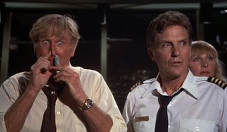 Airplane Lloyd Bridges sniffs glue as Robert Stack explains the situation