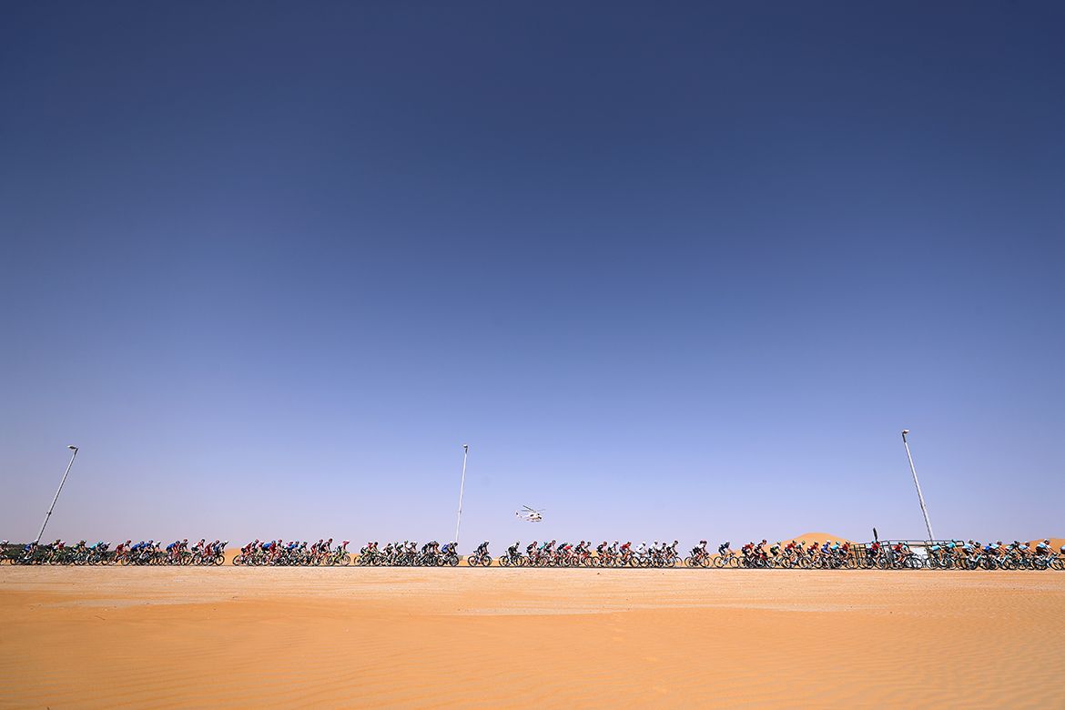 The peloton riding through the Abu Dhabi desert