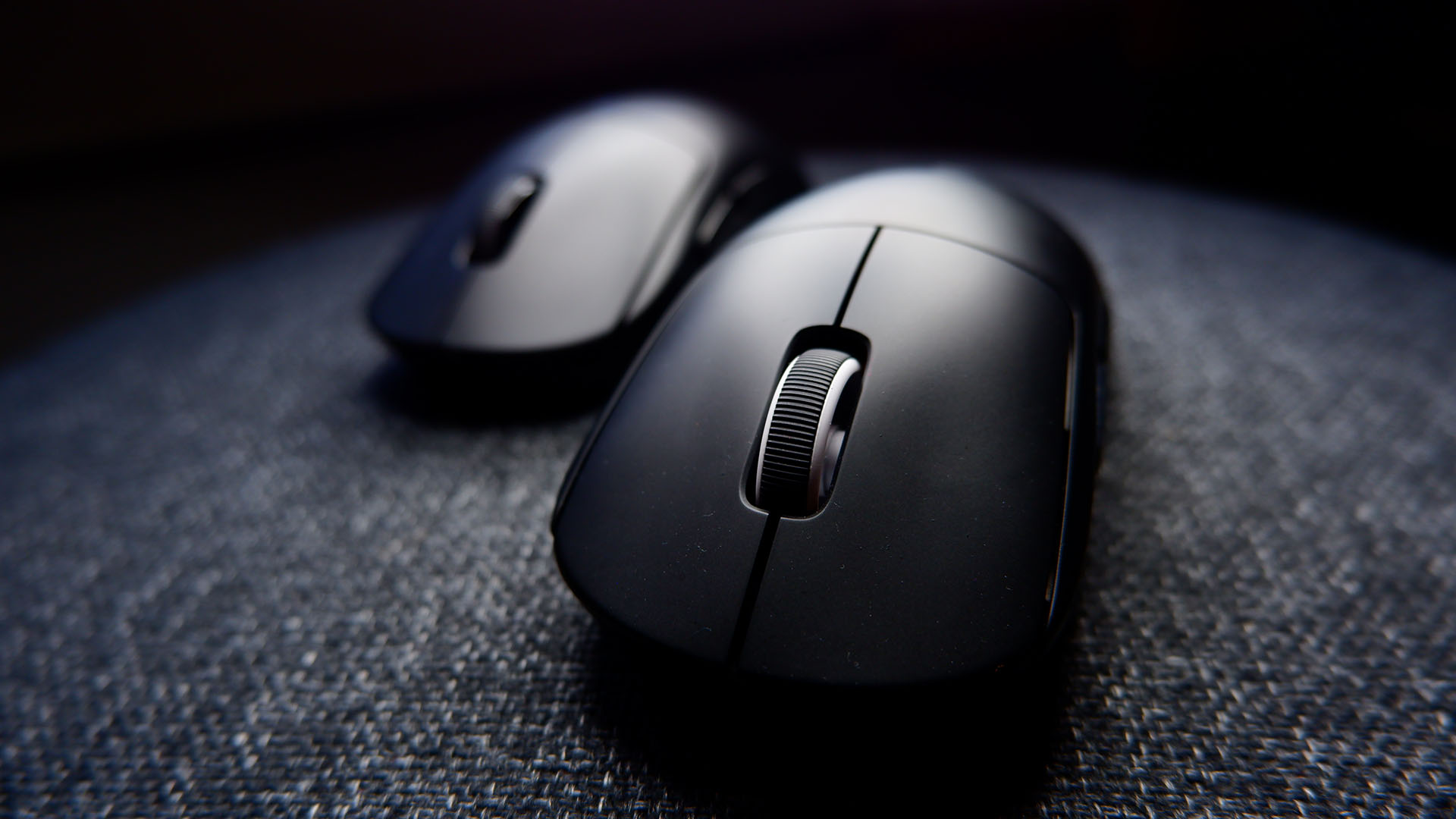 Logitech G Pro X Superlight gaming mouse pictured with dark background