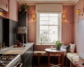 pink kitchen with window seat and wall panels