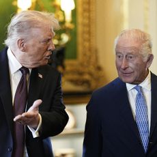 WINDSOR, ENGLAND - SEPTEMBER 17: US President Donald Trump (L) and King Charles III view items on display during a visit to the Royal Collection exhibition, in the Green Drawing Room during the State visit by the President of the United States of America at Windsor Castle on September 17, 2025 in Windsor, England. (Photo by Aaron Chown - WPA Pool/Getty Images)