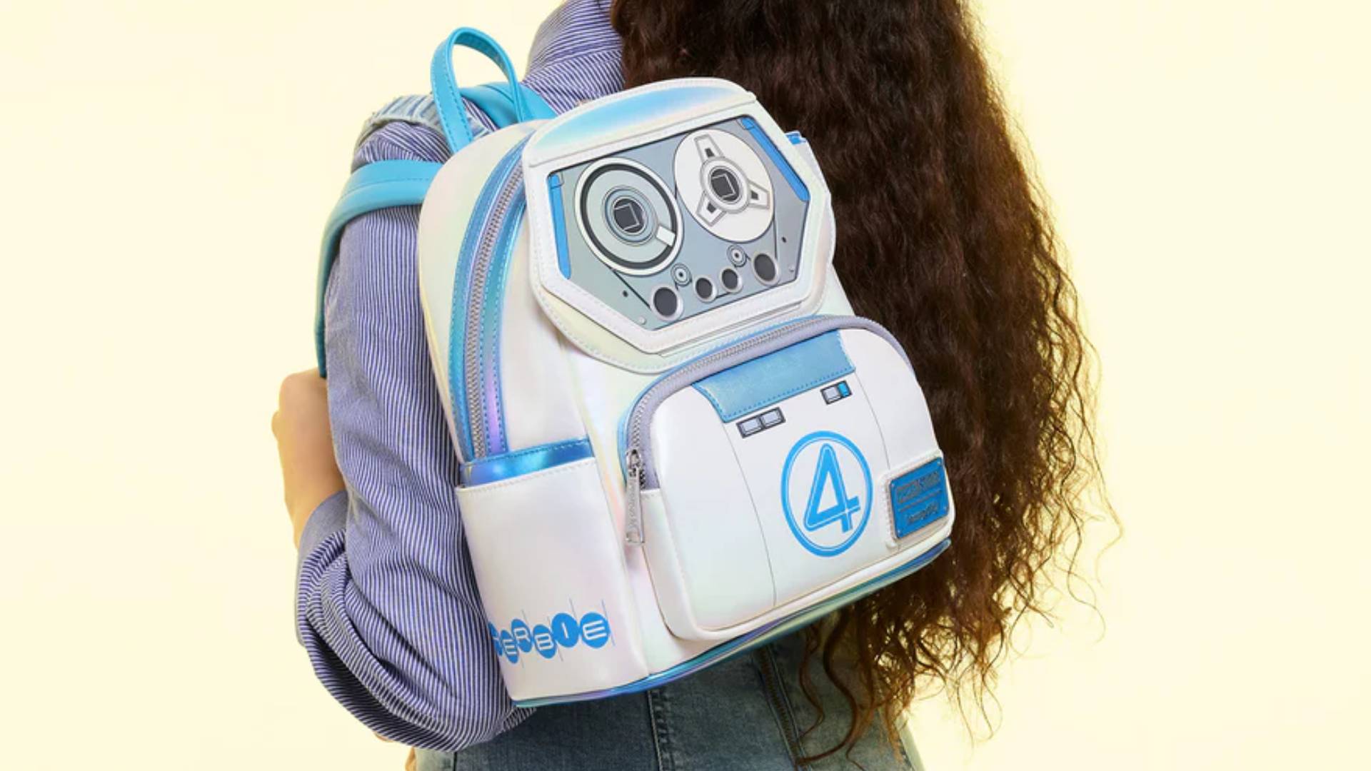 Fantastic Four H.E.R.B.I.E. mini backpack on fem presenting person's back.