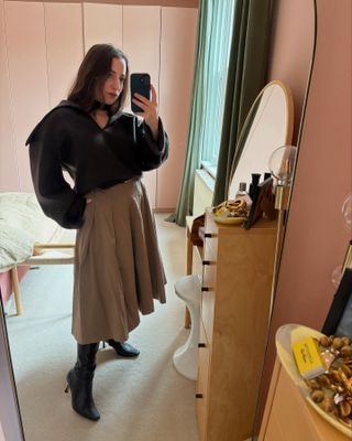 An image of Who What Wear UK editor, Hannah Almassi, wearing one of the best skirts.