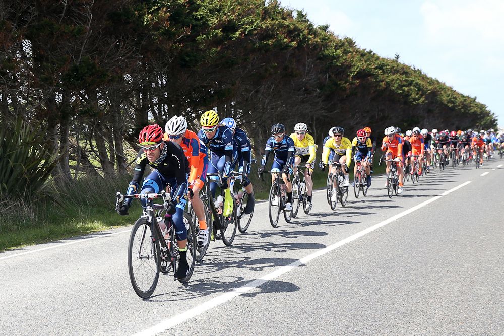 The main peloton makes their way towards Tuatapere during stage three of the Tour of Southland