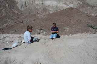 Ryan Williamson (left) and Taylor Williamson (right), the twin sons of Thomas Williamson, found the fossil site during a fossil collecting trip with their father when they were 11 years old. (The twins are now in their early 20s, and still talk with their dad about fossils.)