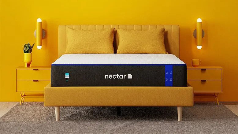 The image shows the Nectar Memory Foam Mattress, Nectar's best mattress for most sleepers, on a yellow bed frame in a yellow bedroom