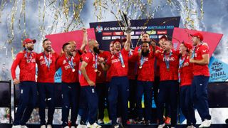 England's cricket team celebrating a victory over Pakistan in the T20 World Cup final in 2022.