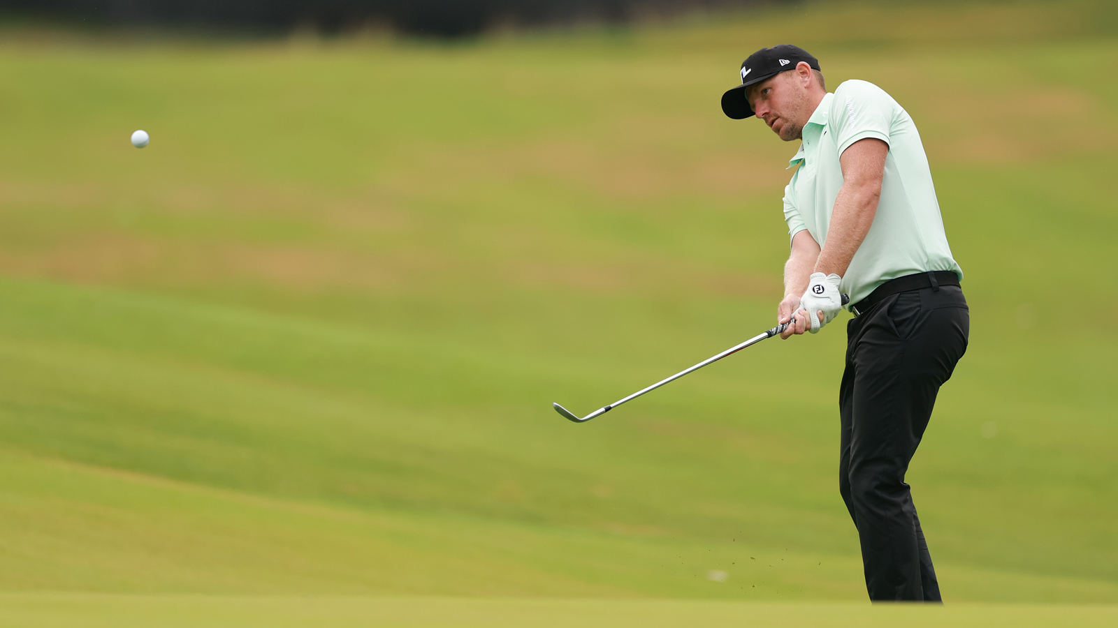 Matt Wallace hits a chip