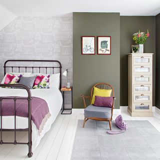 bedroom with dark green walls and grey wallpaper