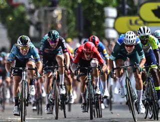 Alpecin-Deceuninck's Belgian rider Jasper Philipsen (3rd R) sprints to the finish line ahead of Astana Qazaqstan Team's British rider Mark Cavendish (L) and Intermarche - Circus - Wanty's Eritrean rider Biniam Girmay (2nd R) to win the 7th stage of the 110th edition of the Tour de France cycling race, 170 km between Mont-de-Marsan and Bordeaux, in southwestern France, on July 7, 2023. (Photo by Marco BERTORELLO / AFP) (Photo by MARCO BERTORELLO/AFP via Getty Images)
