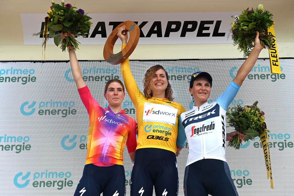 EBNATKAPPEL SWITZERLAND JUNE 20 LR Demi Vollering of The Netherlands and Team SD Worx on second place race winner Marlen Reusser of Switzerland and Team SD Worx Yellow Leader Jersey and Elisa Longo Borghini of Italy and Team TrekSegafredo on third place pose on the podium ceremony after the the 3rd Tour de Suisse Women 2023 Stage 4 a 1008km stage from EbnatKappel to EbnatKappel UCIWWT on June 20 2023 in EbnatKappel Switzerland Photo by Tim de WaeleGetty Images