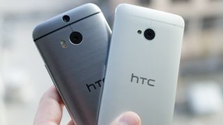 HTC One M7 and One M8 being held together