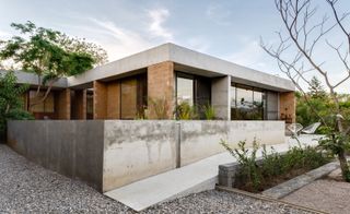 The house was built by local people from stone, adobe block, timber, marble and concrete