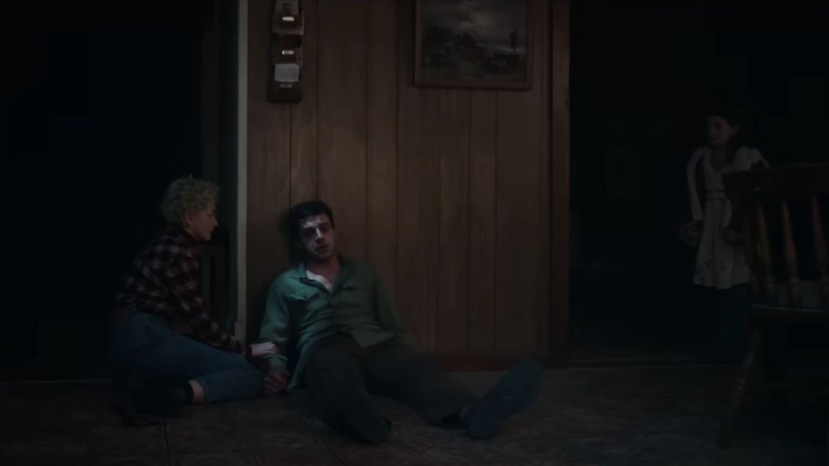 Julia Garner comforting Christopher Abbott in Wolf Man