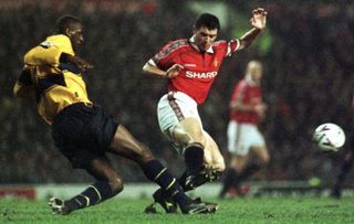 Patrick Vieira and Roy Keane clash on the pitch