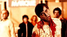 A group of bloodied zombies in Dawn of the Dead