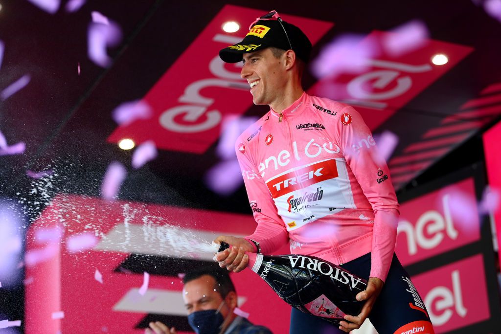 MESSINA ITALY MAY 11 Juan Pedro Lpez of Spain and Team Trek Segafredo celebrates winning the pink leader jersey on the podium ceremony after the 105th Giro dItalia 2022 Stage 5 a 174km stage from Catania to Messina Giro WorldTour on May 11 2022 in Messina Italy Photo by Tim de WaeleGetty Images