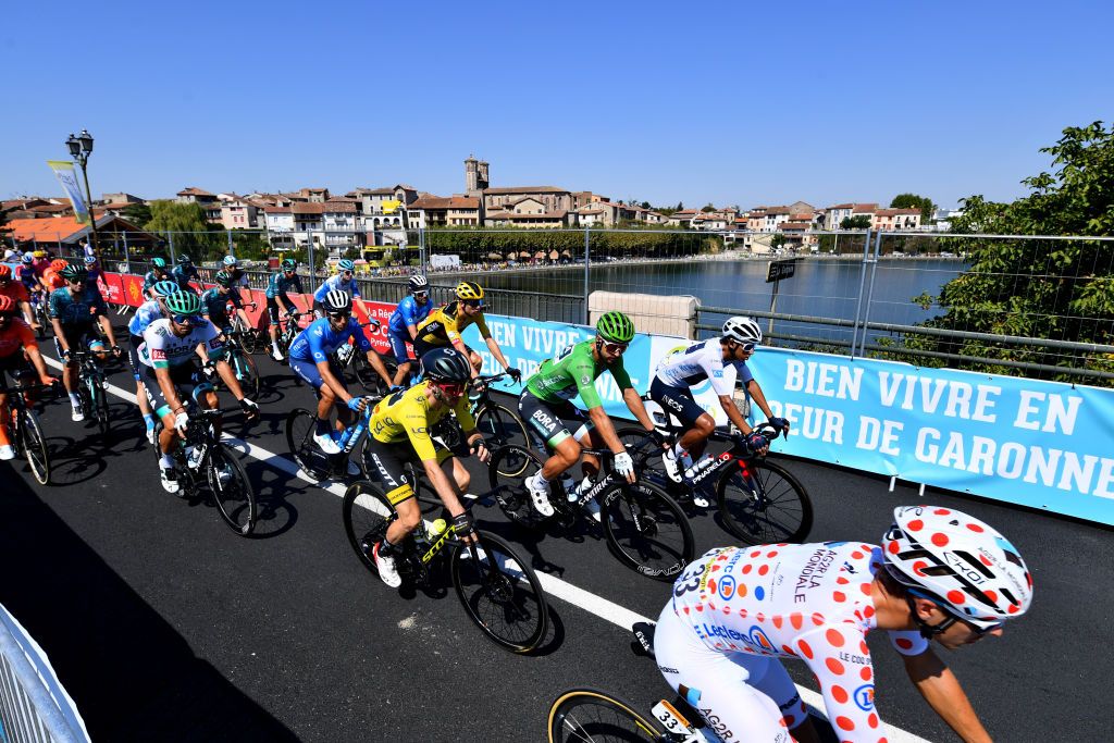 LOUDENVIELLE FRANCE SEPTEMBER 05 Start Adam Yates of The United Kingdom and Team Mitchelton Scott Yellow Leader Jersey Peter Sagan of Slovakia and Team Bora Hansgrohe Green Points Jersey Egan Arley Bernal Gomez of Colombia and Team INEOS Grenadiers White Best Young Rider Jersey Benoit Cosnefroy of France and Team Ag2R La Mondiale Polka Dot Mountain Jersey CazresSurGaronne Village Bridge Peloton during the 107th Tour de France 2020 Stage 8 a 141km stage from CazresSurGaronne to Loudenvielle TDF2020 LeTour on September 05 2020 in Loudenvielle France Photo by Stuart FranklinGetty Images