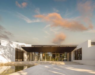 gulbenkian foundation's new art museum with swooping kengo kuma timber roof and quite greenery in Lisbon