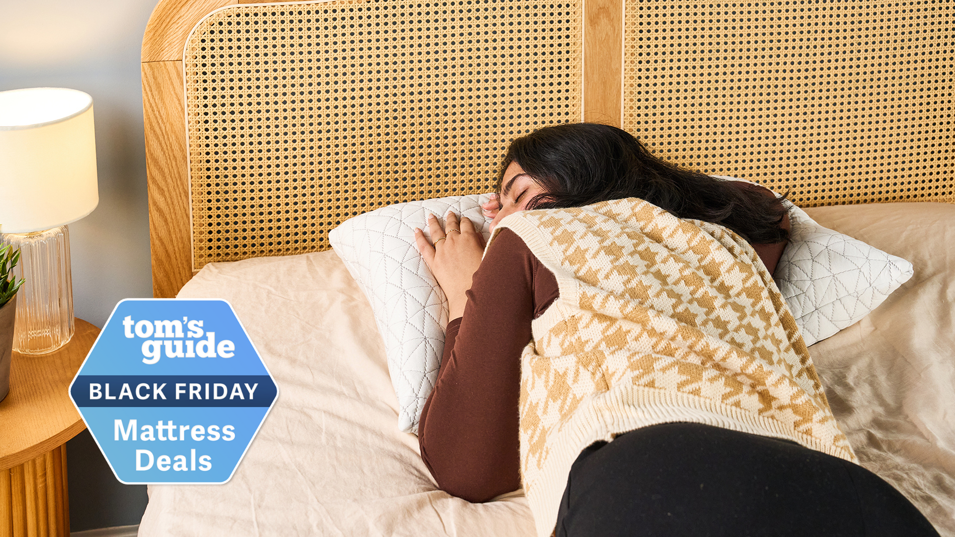 Woman sleeping on the Coop Original Adjustable pillow lying on her stomach 