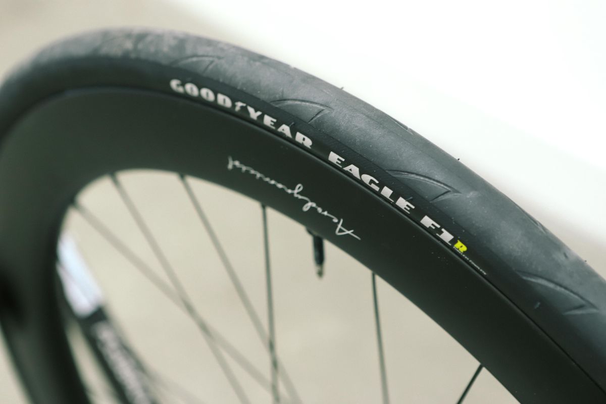 a close up of a black road bike tyre