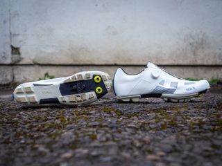 A white pair of Fizik Vento Proxy gravel shoes